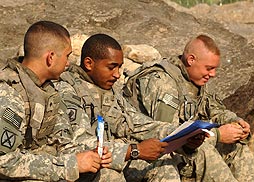 Soldiers wearing Warrior GloTape patch